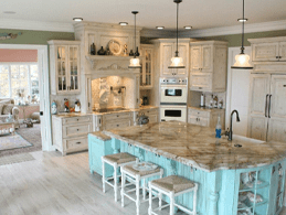 kitchen with large granite island and countertops